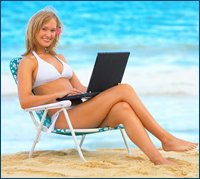 Image result for working on a laptop on a beach